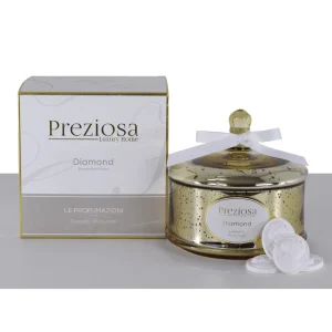 Cofanetto in vetro e dorato con gessetti profumati.